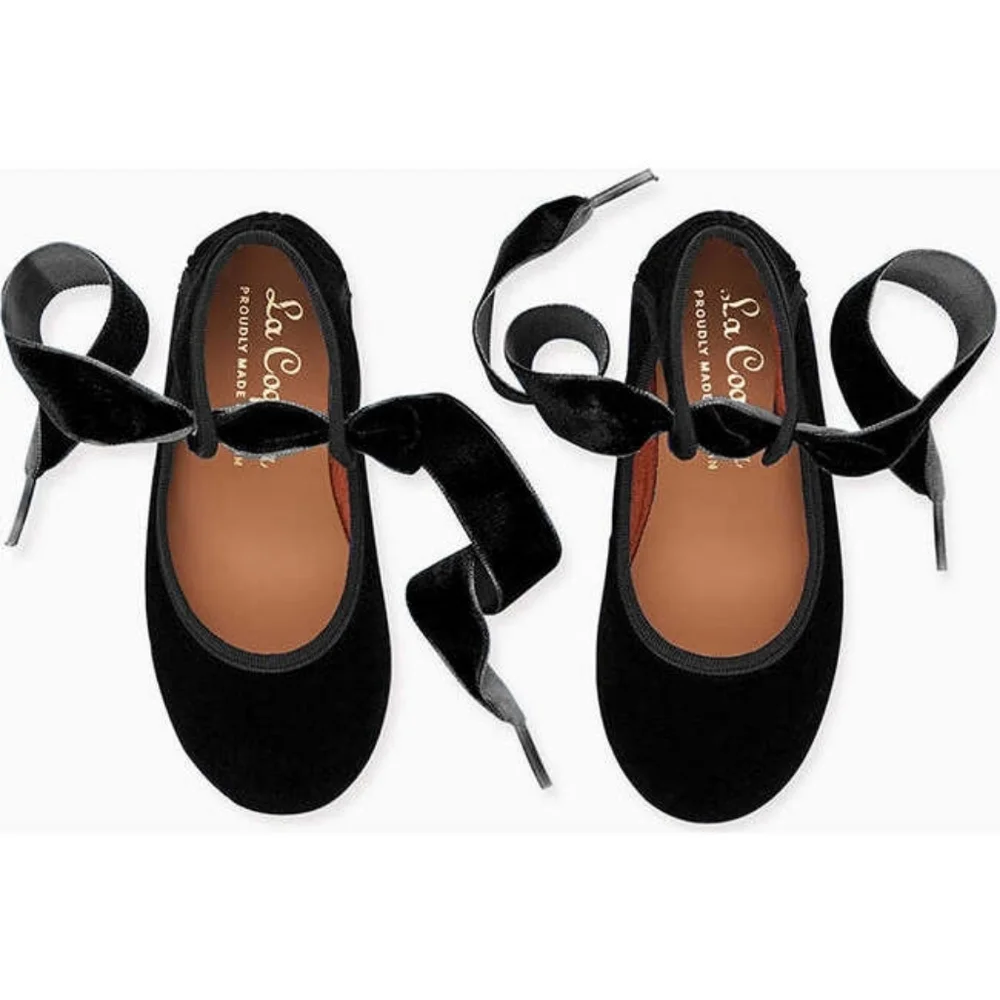 La Coqueta's stunning Black Bow Ballerina shoes.
